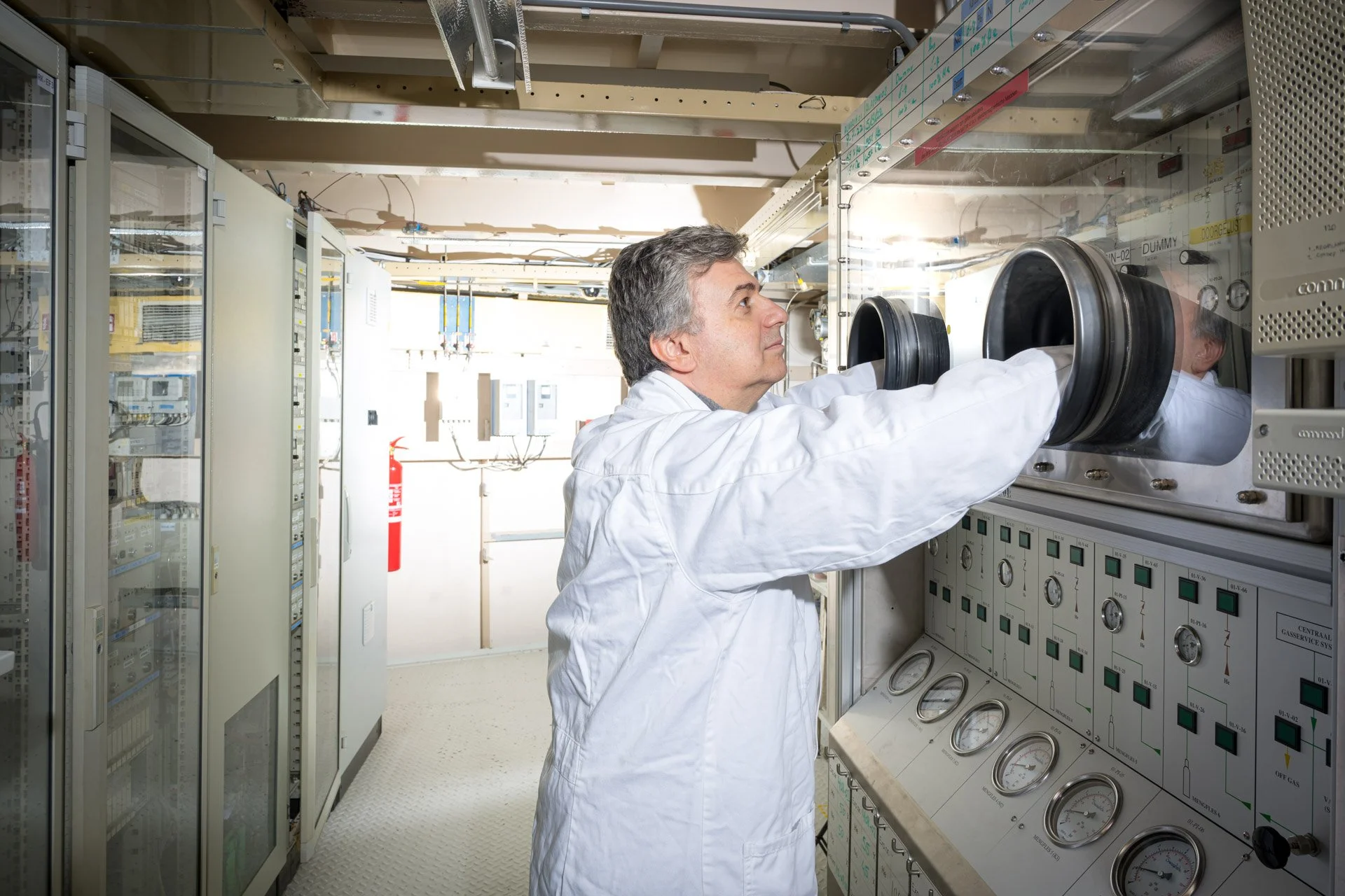 A scientist checking data at the JRC in Petten